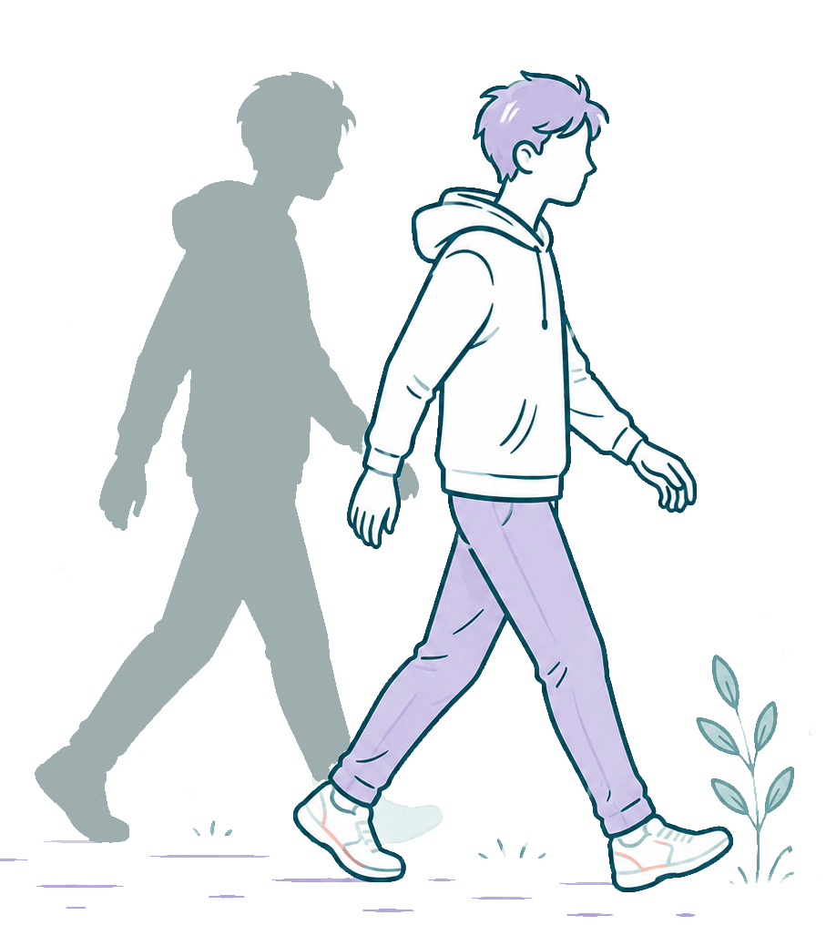 A person walking forward as their shadow trails behind