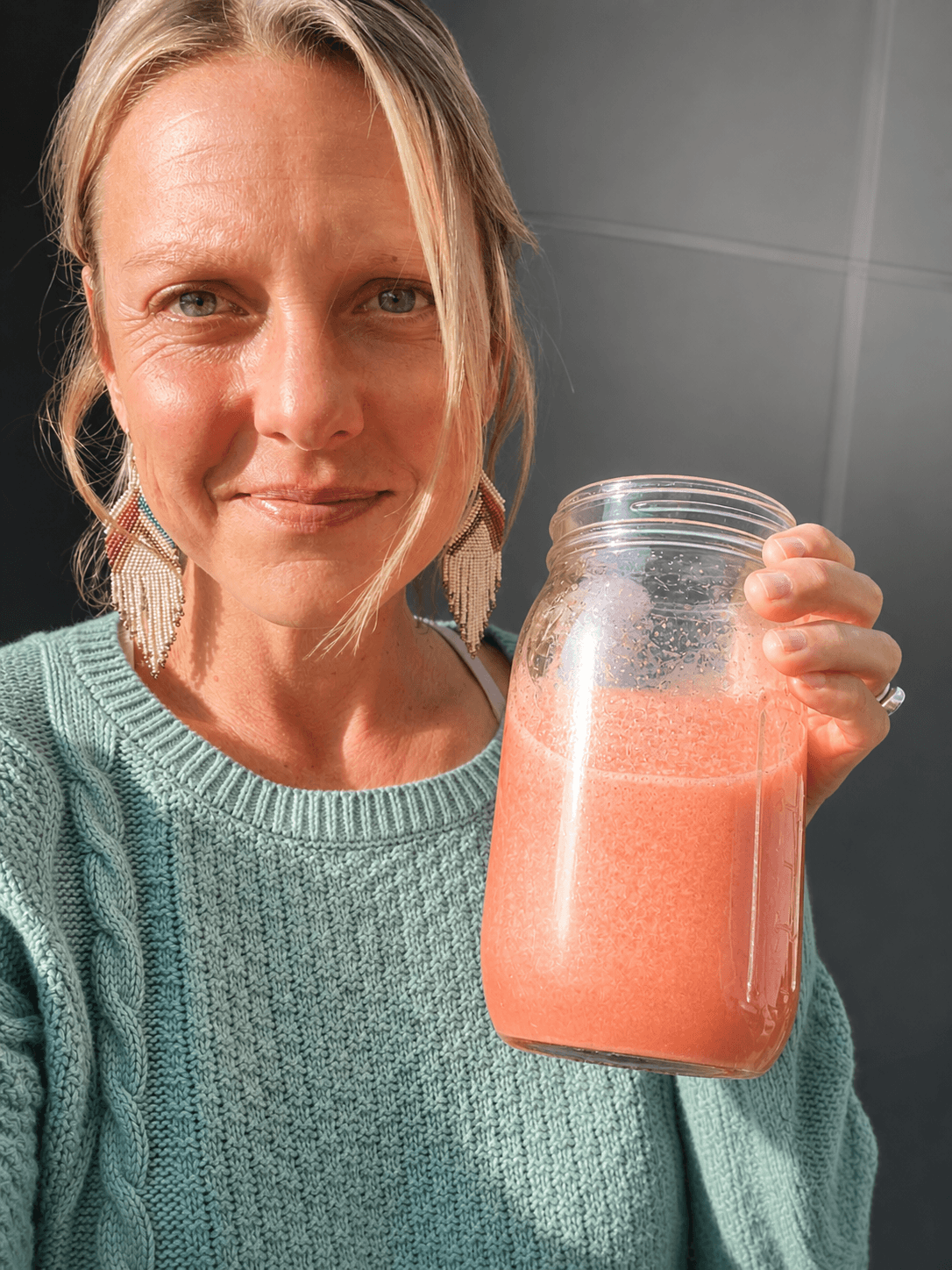 Tasha Darwent holding a fresh smoothie